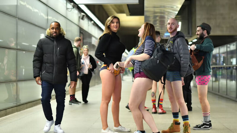 For “No Trousers Day,” London commuters don only their shoes and a half-suit.